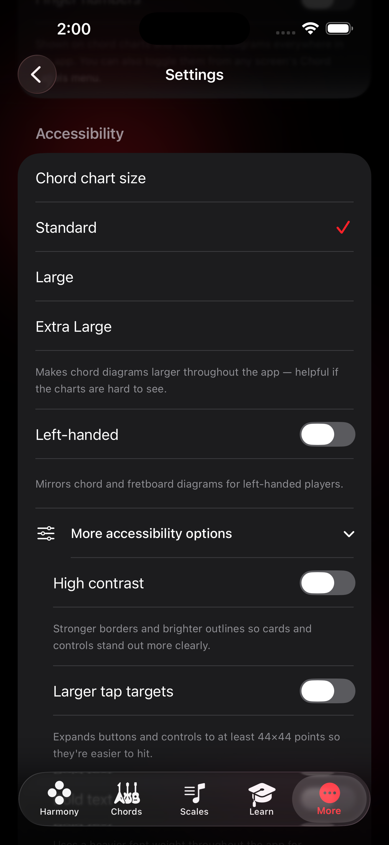 Settings screen showing accessibility toggles for contrast, tap targets, and left-handed mode